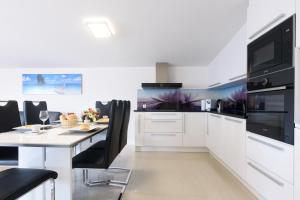 Kuchyň nebo kuchyňský kout v ubytování Studio Apartment Maslina