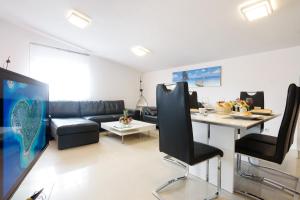 TV a/nebo společenská místnost v ubytování Studio Apartment Maslina