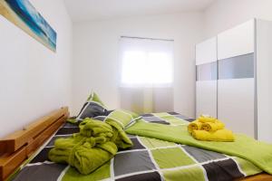 Postel nebo postele na pokoji v ubytování Studio Apartment Maslina