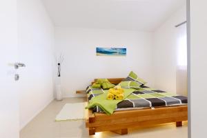 Postel nebo postele na pokoji v ubytování Studio Apartment Maslina