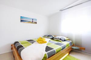 Postel nebo postele na pokoji v ubytování Studio Apartment Maslina