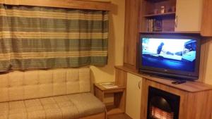 TV a/nebo společenská místnost v ubytování Haven Holiday Home Caister on Sea + 19 fotografií