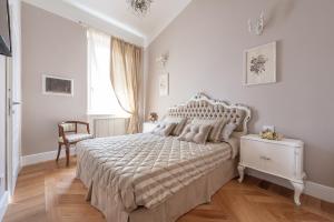 Posteľ alebo postele v izbe v ubytovaní Santaelisabettafirenze1