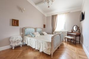 Posteľ alebo postele v izbe v ubytovaní Santaelisabettafirenze1