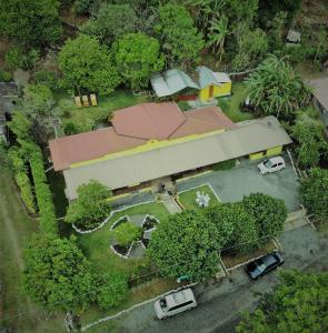 an overhead view of a building with cars in a parking lot at Agaseke Lodge Boquete in Boquete