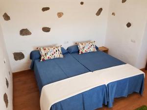 Postel nebo postele na pokoji v ubytování Casa el Gallo