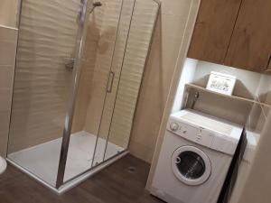 Ванна кімната в Apartment Gold & Gray