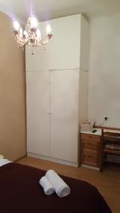 Postel nebo postele na pokoji v ubytování Palac - Giordano