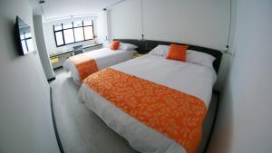 Ένα ή περισσότερα κρεβάτια σε δωμάτιο στο Hotel RDOS