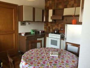 Kuchyň nebo kuchyňský kout v ubytování Casa Piave + 2 fotografie