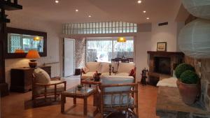 Χώρος καθιστικού στο VILLAS COSETTE - Villa Triana