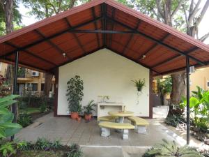 Κήπος έξω από το Coco Beach Home