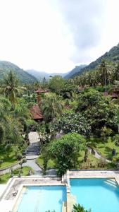 an aerial view of a resort with two pools at Villa Campi Sorga in Senggigi 