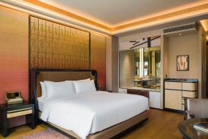 Voodi või voodid majutusasutuse MGM Cotai toas
