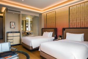 Voodi või voodid majutusasutuse MGM Cotai toas