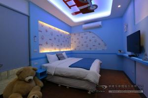 Postel nebo postele na pokoji v ubytování Qing Xin Ju Homestay