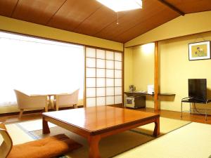 Sjónvarps- og/eða afþreyingartæki á Atami Onsen Hotel Yume Iroha