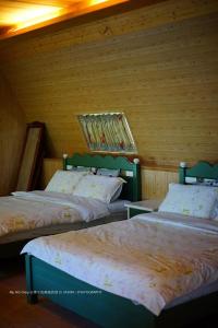 Postel nebo postele na pokoji v ubytování Knt House + 37 fotografií