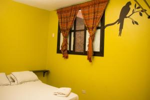 Letto o letti in una camera di Dreamkapture Hostel close to the airport and bus terminal