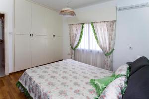Ένα ή περισσότερα κρεβάτια σε δωμάτιο στο Despoina Town House