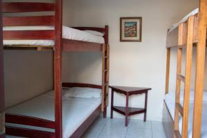 Letto o letti in una camera di Dreamkapture Hostel close to the airport and bus terminal