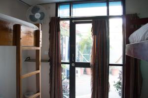Letto o letti in una camera di Dreamkapture Hostel close to the airport and bus terminal