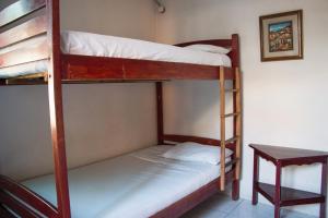 Letto o letti in una camera di Dreamkapture Hostel close to the airport and bus terminal