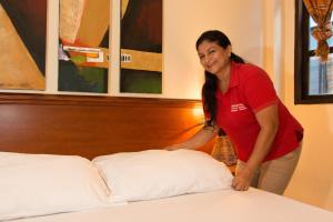 Letto o letti in una camera di Dreamkapture Hostel close to the airport and bus terminal