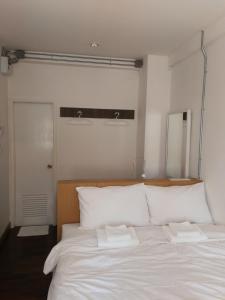 Voodi või voodid majutusasutuse F Plus F Hostel toas