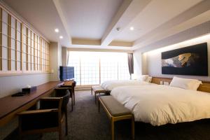 Sjónvarps- og/eða afþreyingartæki á Kyoto Kamanza Hotel