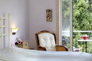 Postel nebo postele na pokoji v ubytování Hotel Hirschen in Freiburg-Lehen