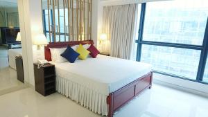 Letto o letti in una camera di IW Hotel