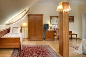 Postel nebo postele na pokoji v ubytování Boutique Hotel Seven Days