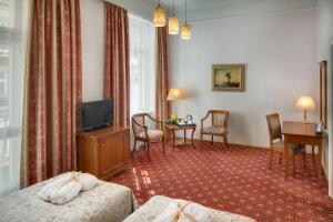 TV a/nebo společenská místnost v ubytování Boutique Hotel Seven Days