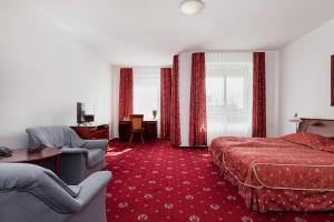 Posteľ alebo postele v izbe v ubytovaní Aparthotel Etna