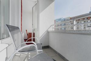 Balkón alebo terasa v ubytovaní Aparthotel Etna