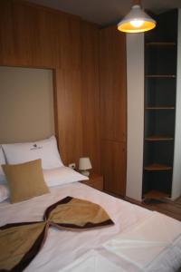 Hotel LISS 2客房内的一张或多张床位