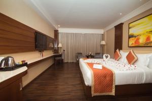 Postel nebo postele na pokoji v ubytování Shakun Hotels And Resorts