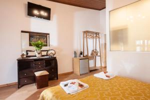 Posteľ alebo postele v izbe v ubytovaní Hamam Suites Sifaka