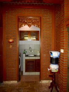 Kuchyň nebo kuchyňský kout v ubytování Villa Campi Sorga