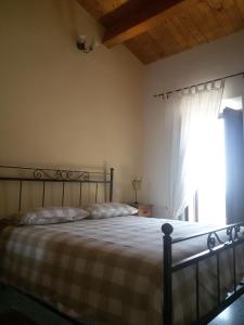 Postel nebo postele na pokoji v ubytování Casa Vacanze Il Sole e la Luna