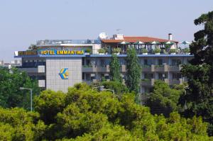 a hotel building with a hotel on top of it at Emmantina Hotel in Athens