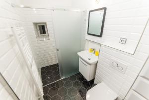 Kúpeľňa v ubytovaní Babylon Apartmány