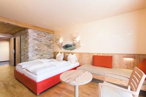 Ένα ή περισσότερα κρεβάτια σε δωμάτιο στο JUFA Hotel Annaberg