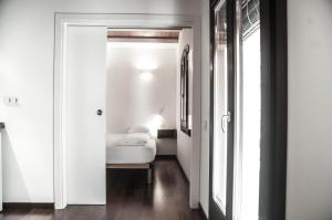 Postel nebo postele na pokoji v ubytování Barcelona Beach Apartments