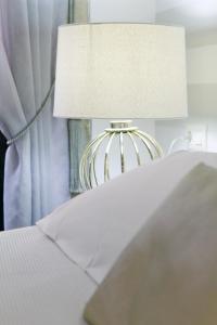 A bed or beds in a room at Inicia Casas Reales