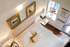 A bed or beds in a room at Inicia Casas Reales
