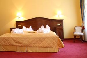 Postel nebo postele na pokoji v ubytování Hotel Apartment Rothensteiner