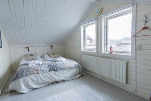 Postel nebo postele na pokoji v ubytování Väderöarnas Värdshus & Konferens