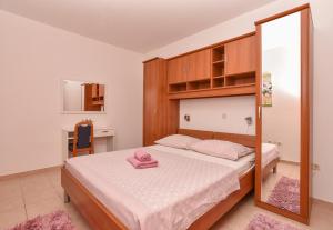 Postel nebo postele na pokoji v ubytování Villa Ivka